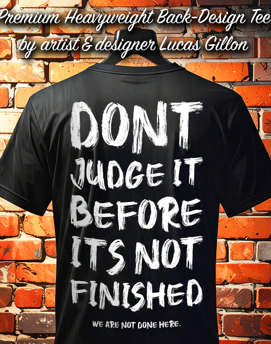 Black Unisex Premium Heavyweight Back-Design Tee "Before It's Not Finished" by Designer and Artist Lucas Gillon