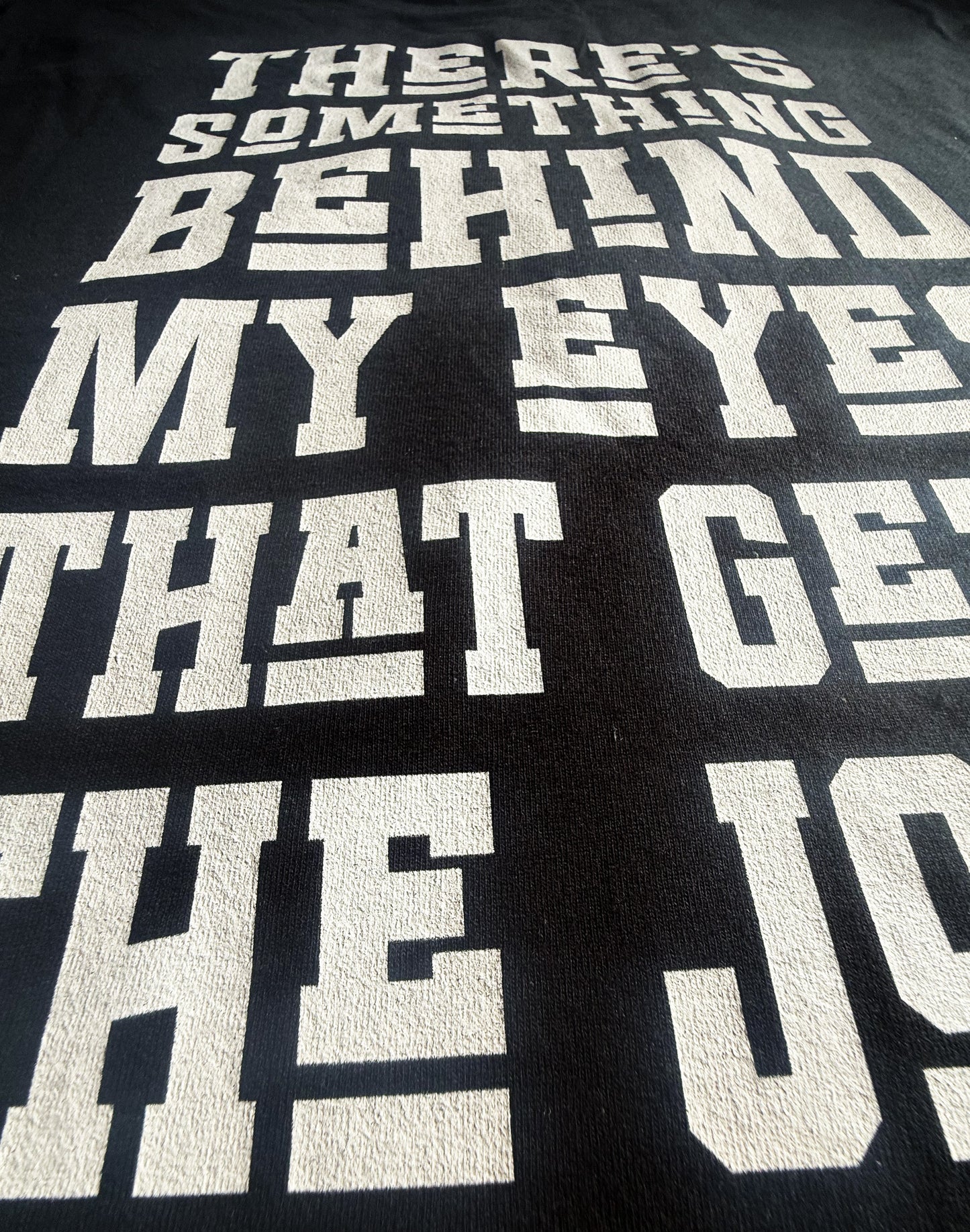 Black Unisex Premium Original Heavyweight Back-Design Tee "The Joke" by Designer and Artist Lucas Gillon