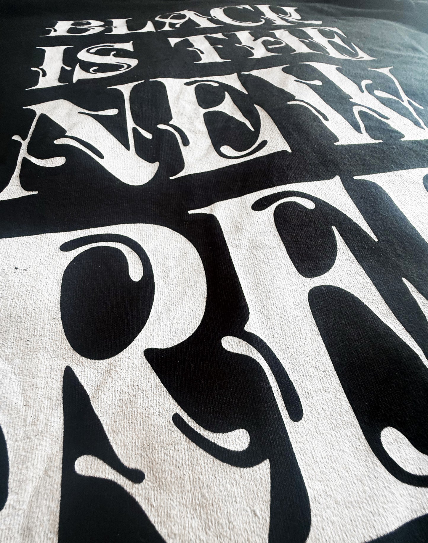 Black Unisex Premium Original Heavyweight Back-Design Tee "Black is the new Red" by Designer and Artist Lucas Gillon