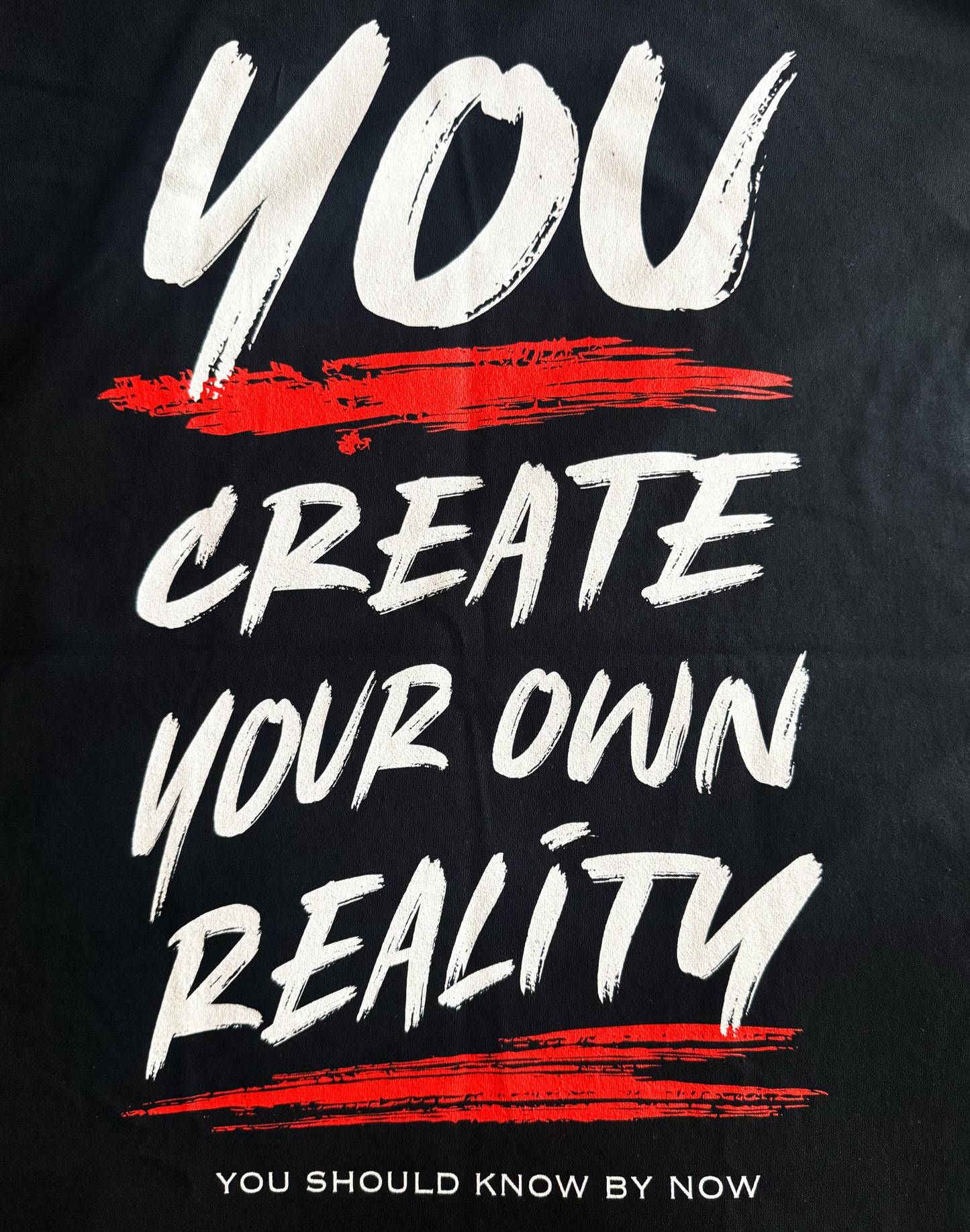 Black Unisex Premium Heavyweight Back-Design Tee "You Create Your Own Reality" by Designer and Artist Lucas Gillon