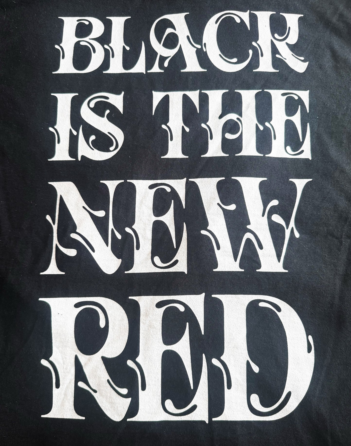 Black Unisex Premium Original Heavyweight Back-Design Tee "Black is the new Red" by Designer and Artist Lucas Gillon