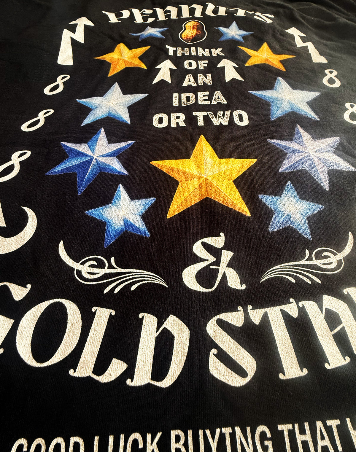 Black Unisex Premium Heavyweight Back-Design Tee "Peanuts & Gold Stars" by Designer and Artist Lucas Gillon