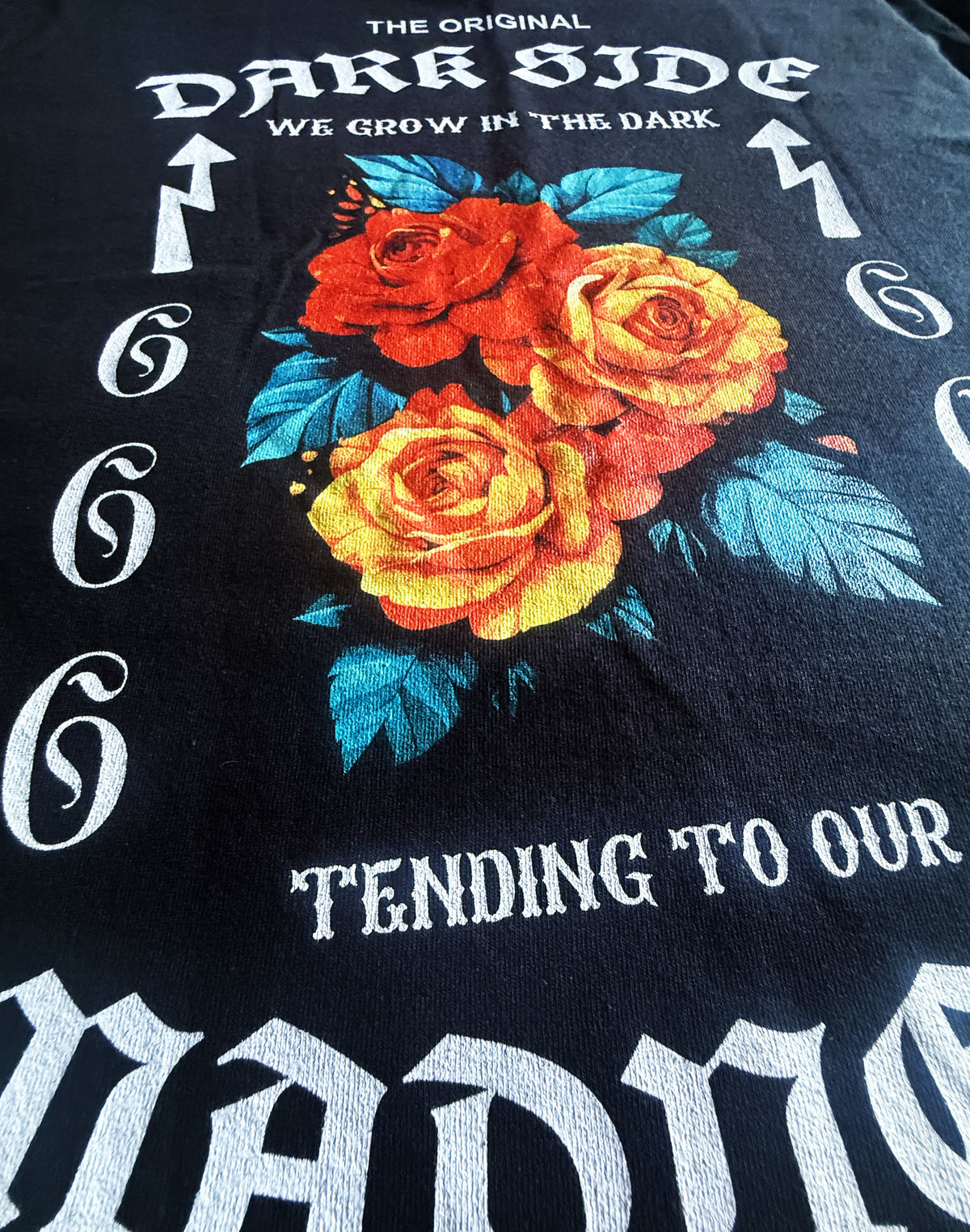 Black Unisex Premium Heavyweight Back-Design Tee "Dark Side - We Grow In The Dark" by Designer and Artist Lucas Gillon