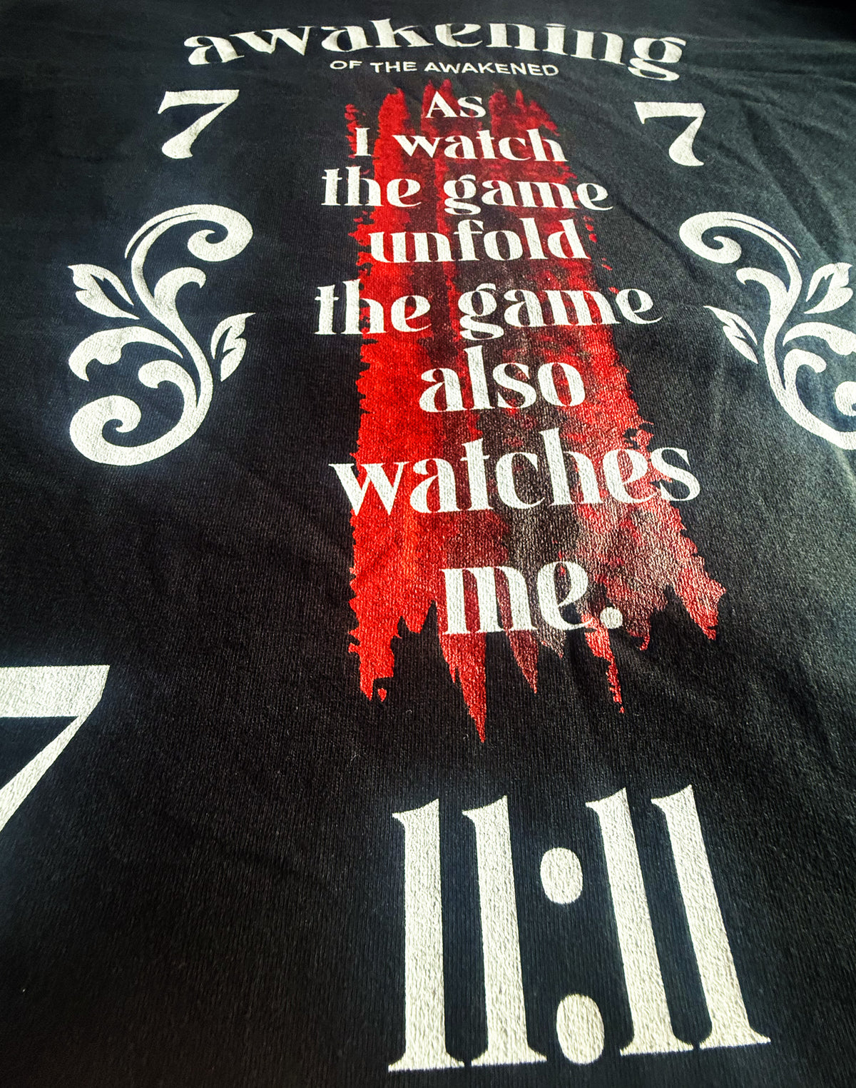 Black Unisex Premium Heavyweight Back-Design Tee "Awakening of the Awakened - The Game Also Watches Me" by Designer and Artist Lucas Gillon