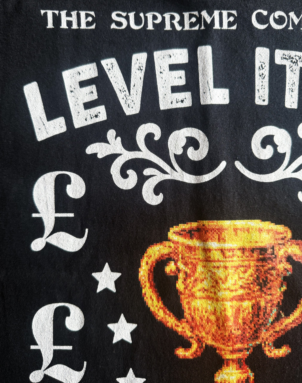 Black Unisex Premium Heavyweight Back-Design Tee "Level It Up - Gold Trophy" by Designer and Artist Lucas Gillon