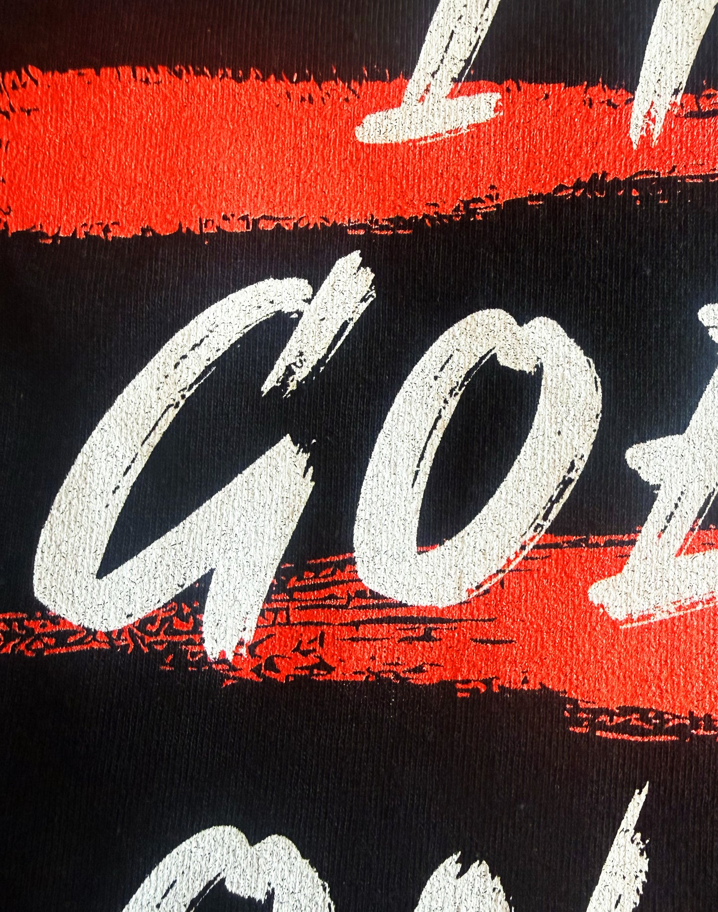 Black Unisex Premium Heavyweight Back-Design Tee "It Goes On" by Designer and Artist Lucas Gillon