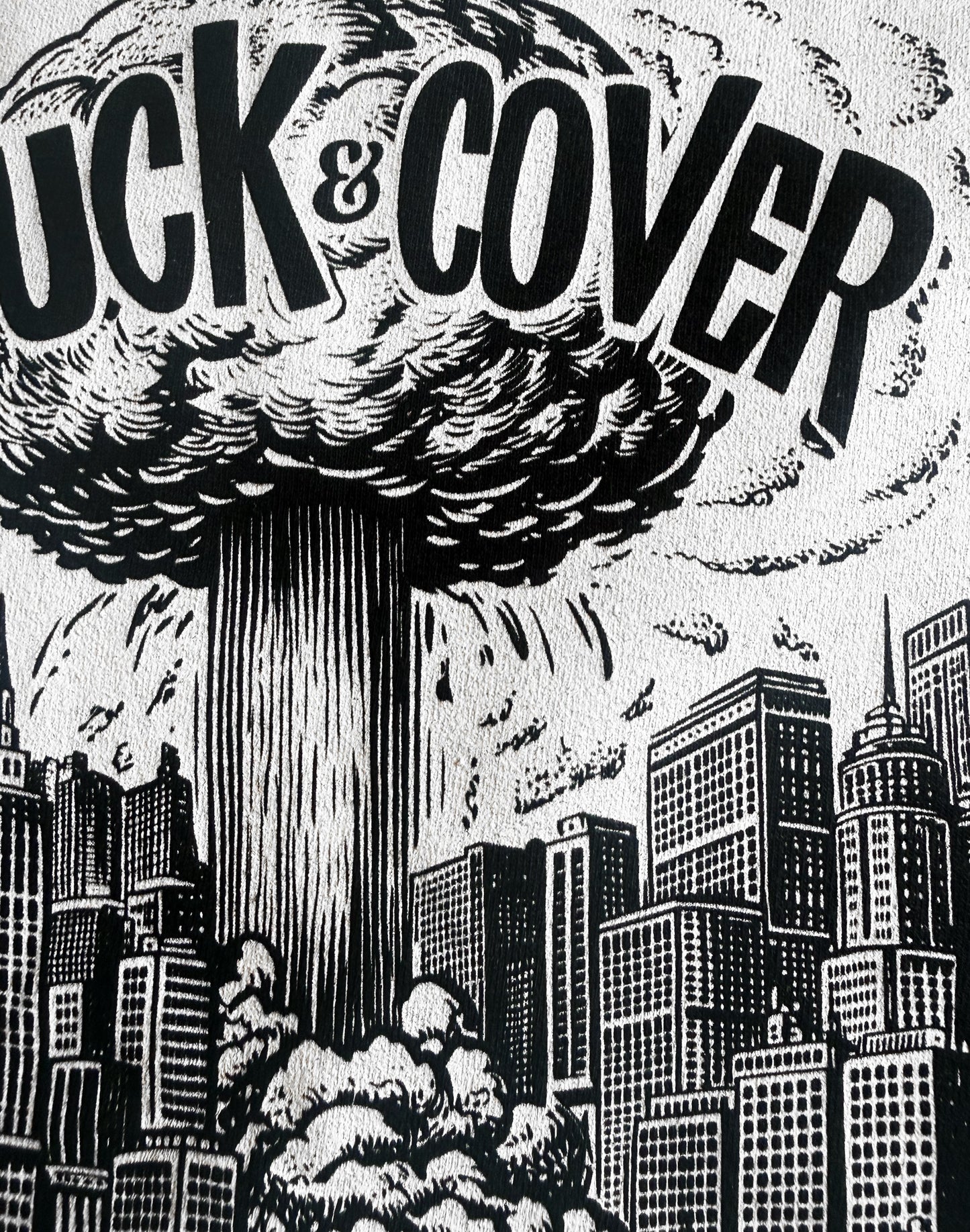 Black Unisex Premium Original Heavyweight Back-Design Tee "Duck & Cover" by Designer and Artist Lucas Gillon