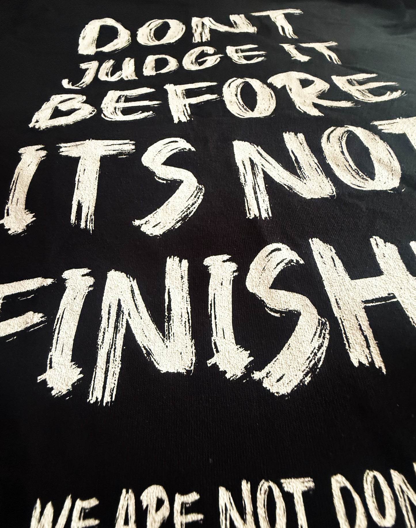 Black Unisex Premium Heavyweight Back-Design Tee "Before It's Not Finished" by Designer and Artist Lucas Gillon
