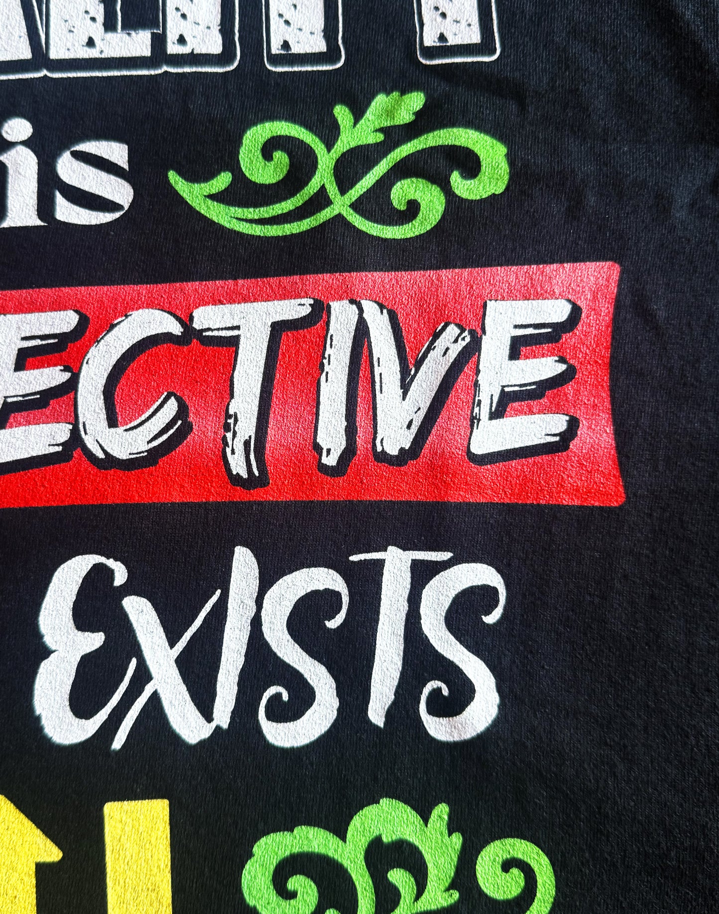 Black Unisex Premium Heavyweight Back-Design Tee "Reality is Subjective" by Designer and Artist Lucas Gillon