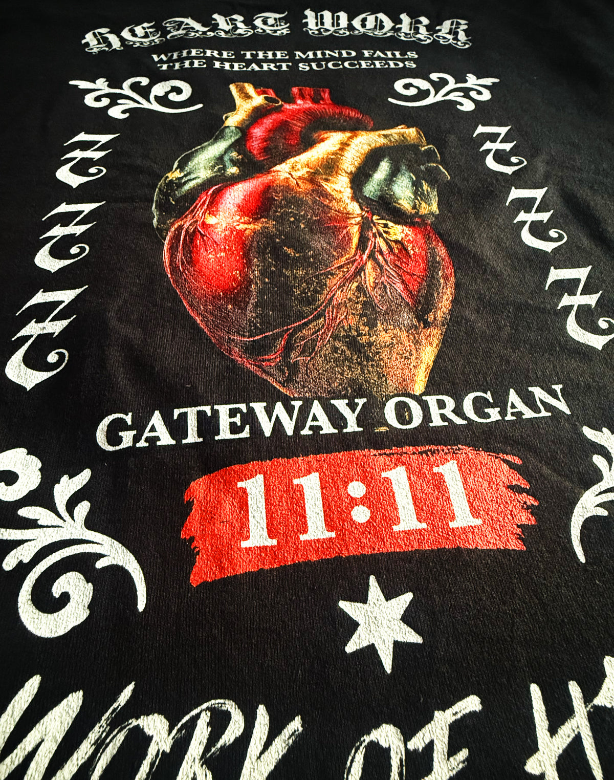 Black Unisex Premium Heavyweight Back-Design Tee "Heart Work" by Designer and Artist Lucas Gillon