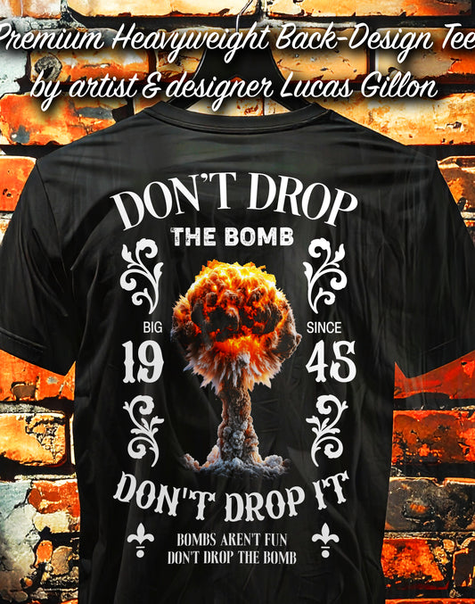 to finish - Black Unisex Premium Heavyweight Back-Design Tee "Don't Drop The Bomb" by Designer and Artist Lucas Gillon